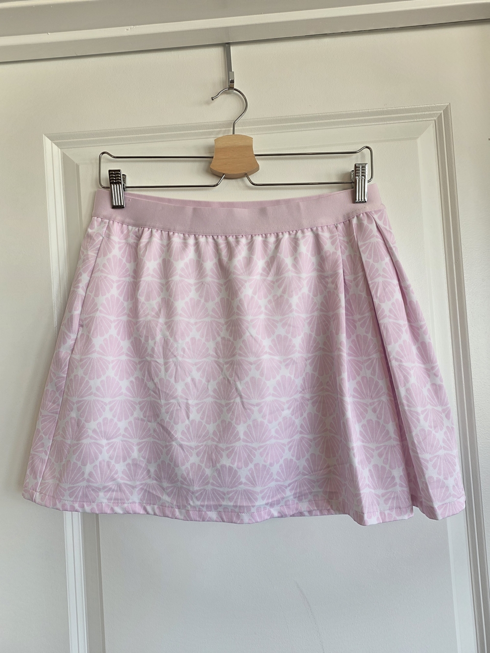Lady Hagen pink and white seashell print side pleat golf skort